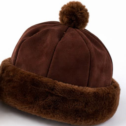 Brown suede-style aviator hat with a fluffy pom-pom and fur trim, warm winter headwear